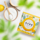 神檸洗衣槽清潔粉200g盒裝，包裝採用檸檬與葉子圖案，配有以木質勺子盛裝的白色清潔粉.