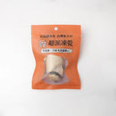 橘色包裝透明窗展示單顆乾燥廣島牛奶牡蠣，袋身印有黑白文字標示商品資訊.