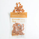 透明包裝袋內裝有橙色鮪魚丁，包裝上有簡約白橙色標籤和「Petcook」字樣.