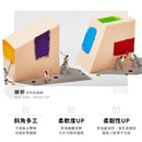 粉色梯形多角度海綿，表面帶有四色拼貼設計，適合化妝使用.