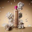 AVEDA 蘊活煥欣櫻花洗頭水 200ml 粉色瓶身搭配盛開白色櫻花瓣.