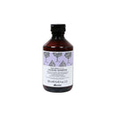 達芬尼斯抗敏洗髮露250ml，棕色塑膠瓶身，白底植物花草圖案標籤.