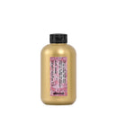 金色塑膠瓶身黑色瓶蓋，粉紅色標籤印有Davines捲髮重建乳霜字樣.