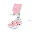 Hello Kitty粉色折疊無線充電支架，底座印有Hello Kitty圖案，帶白色支撐架.