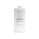 Keune肯葳淨白鏈鍵護髮素漂後矯色護髮乳 1000ml 白色圓柱瓶身簡約設計.